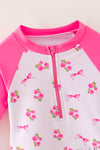 Ditsy floral swimsuit with fuchsia long sleeves. Amy