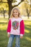 Merry Grinchmas" thunder printed pink sweatshirt with fuchsia faux fur sleeves. TPG51370 MON