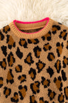 Leopard printed pullover sweater with fuchsia trim and lt. pink bows on sleeves. TPG60423 JEAN
