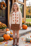 Cream cable knit cardigan with embroidered flowers. TPG60611 AMY