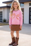 Lt. Pink knit sweater with bow applique and moon stitch trim. TPG60757 MON