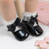 Cute black infant shows w/black front bow. HMZ161B