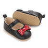 Black dressy baby shoes w/red front bow. BYQ4150B-