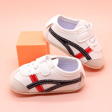  Off white infant tennis shoes with  red & black detail & velcro. YSA007RB