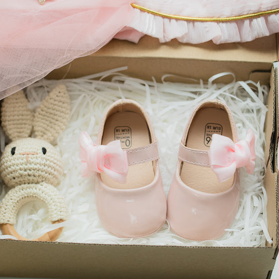 Lt.Pink side bow dressy infant shoes. HM2617