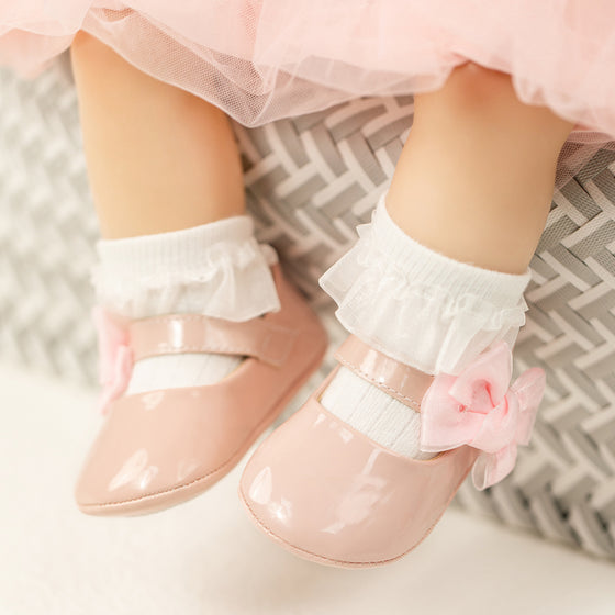 Lt.Pink side bow dressy infant shoes. HM2617