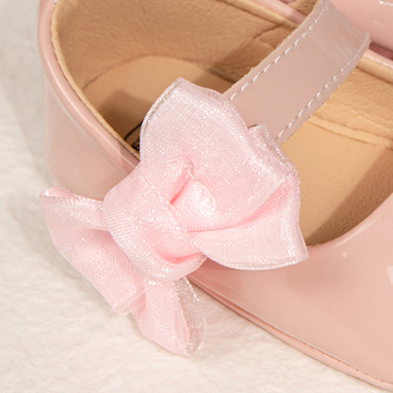 Lt.Pink side bow dressy infant shoes. HM2617