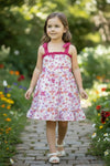 Flamingo printed girls dress with ruffle hem. GSD013023-SOL