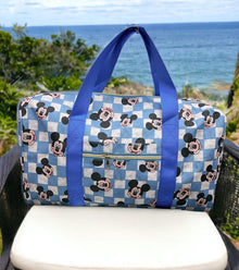  Blue & white checker printed duffle bag.