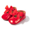 Red infant shoes with red front bow & velcro for easy off on. HMZ1615R