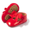 Red infant shoes with red front bow & velcro for easy off on. HMZ1615R