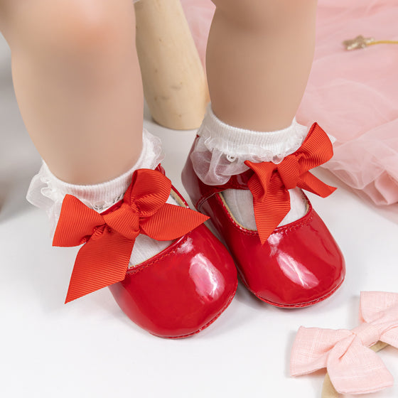 Red infant shoes with red front bow & velcro for easy off on. HMZ1615R