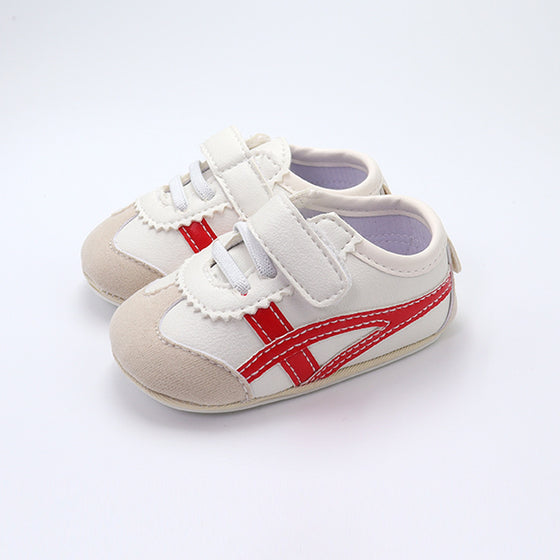 Off white infant tennis shoes with red design & velcro. YSA007R