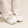 White pleather baby shoes. HM1628