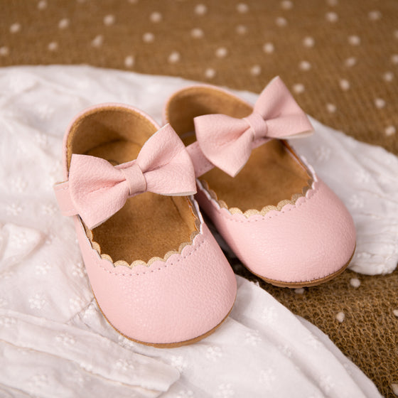 White pleather baby shoes. HM1628