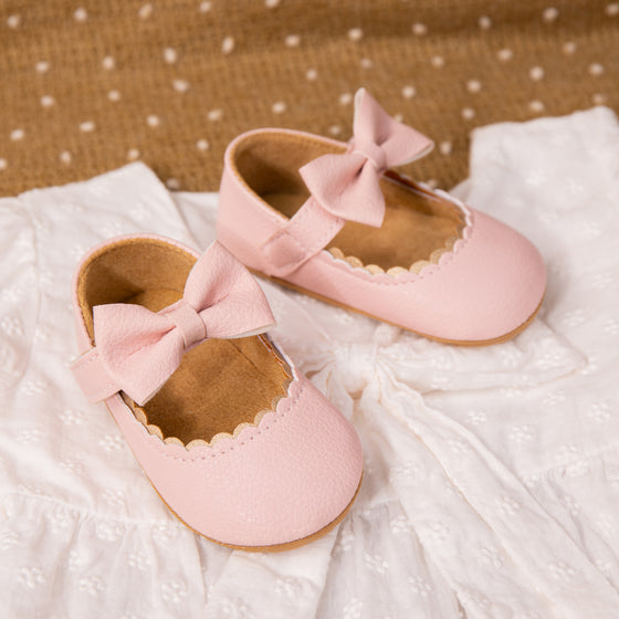 White pleather baby shoes. HM1628