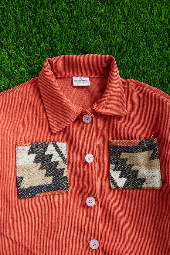 BURNT ORANGE CURDOROY SHACKET WITH AZTEC SLEEVES. TPG651522224 SOL