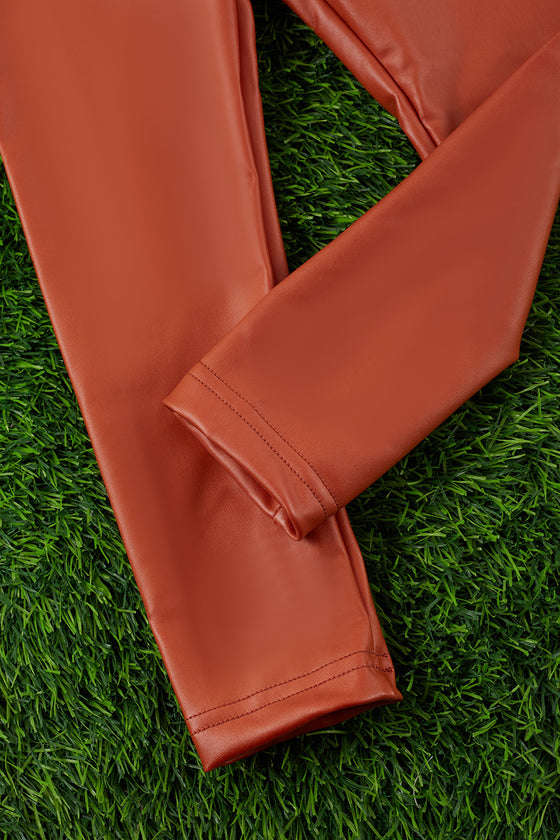 RUST FAUX LEATHER LEGGINGS. PNG65153008-JEANN