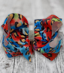  RED & BLUE CHEETAH PRINTED HAIR BOWS WITH RHINESTONES 7.5IN WIDE 4PCS/$10.00 BW-DSG-364