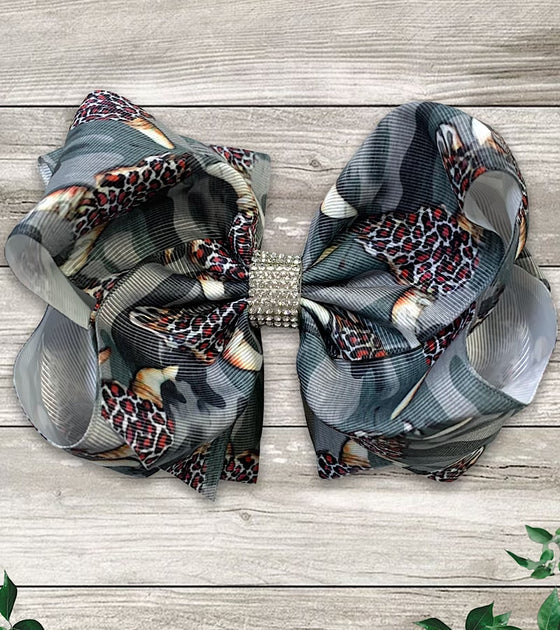 CAMOUFLAGE & COWSKULL PRINTED HAIR BOWS WITH RHINESTONES 7.5IN WIDE 4PCS/$10.00 BW-DSG-390