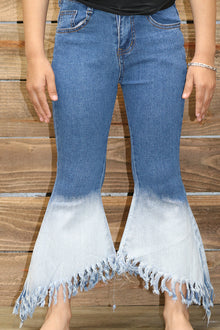  HIGH-LOW BLEACHED DENIM JEANS WITH DISTRESSED HEM. PNG651522048-AMYY