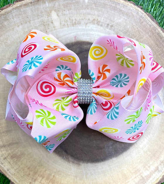 STARLIGHT PRINTED BOW 7.5" WIDE 4PCS/$10.00 BW-DSG-600.