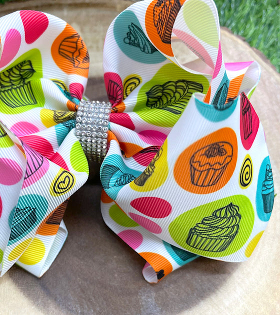 CUPCAKE PRINTED BOW 7.5" WIDE 4PCS/$10.00 BW-DSG-607