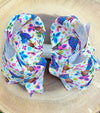 WHITE CHARACTER  PRINTED  BOWS 7.5" WIDE 4PCS/$10.00 BW-DSG-620