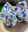 WHITE CHARACTER  PRINTED  BOWS 7.5" WIDE 4PCS/$10.00 BW-DSG-620