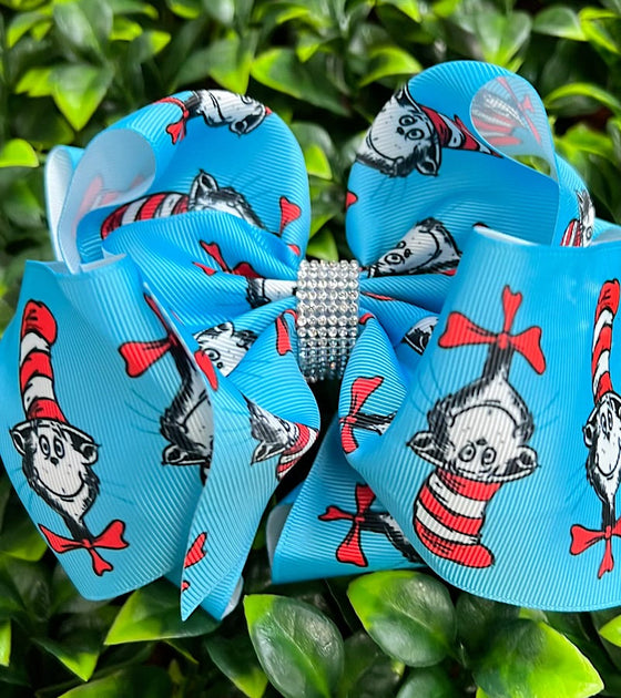 TURQUOISE CHARACTER PRINTED HAIR BOWS. 7.5" WIDE 4PCS/$10.00 BW-DSG-744