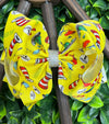 HAT  PRINTED YELLOW DOUBLE LAYER HAIR BOWS. 7.5" WIDE 4PCS/$10.00 BW-DSG-755