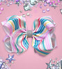 PASTEL STRIPE PRINTED HAIR BOWS. 7.5" WIDE 4PCS/ $10.00 BW-DSG-484.