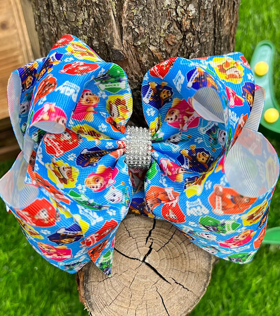 DOG PRINTED ON BLUE  PRINTED DOUBLE LAYER HAIR BOWS. 7.5" WIDE 4PCS/$10.00 BW-DSG-773