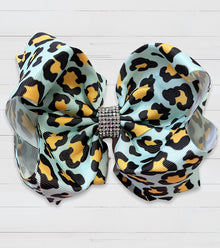  BLUE ANIMAL PRINTED HAIR BOWS. 7.5" WIDE 4PCS/ $10.00 BW-DSG-458